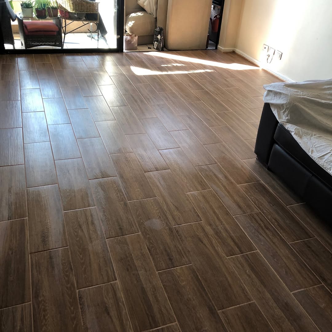 cambio piso flotante x porcelanato vitacura.jpg